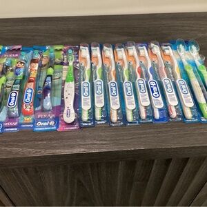 Pre-owned, not used new Oral B toothbrushes. Some children’s and adults